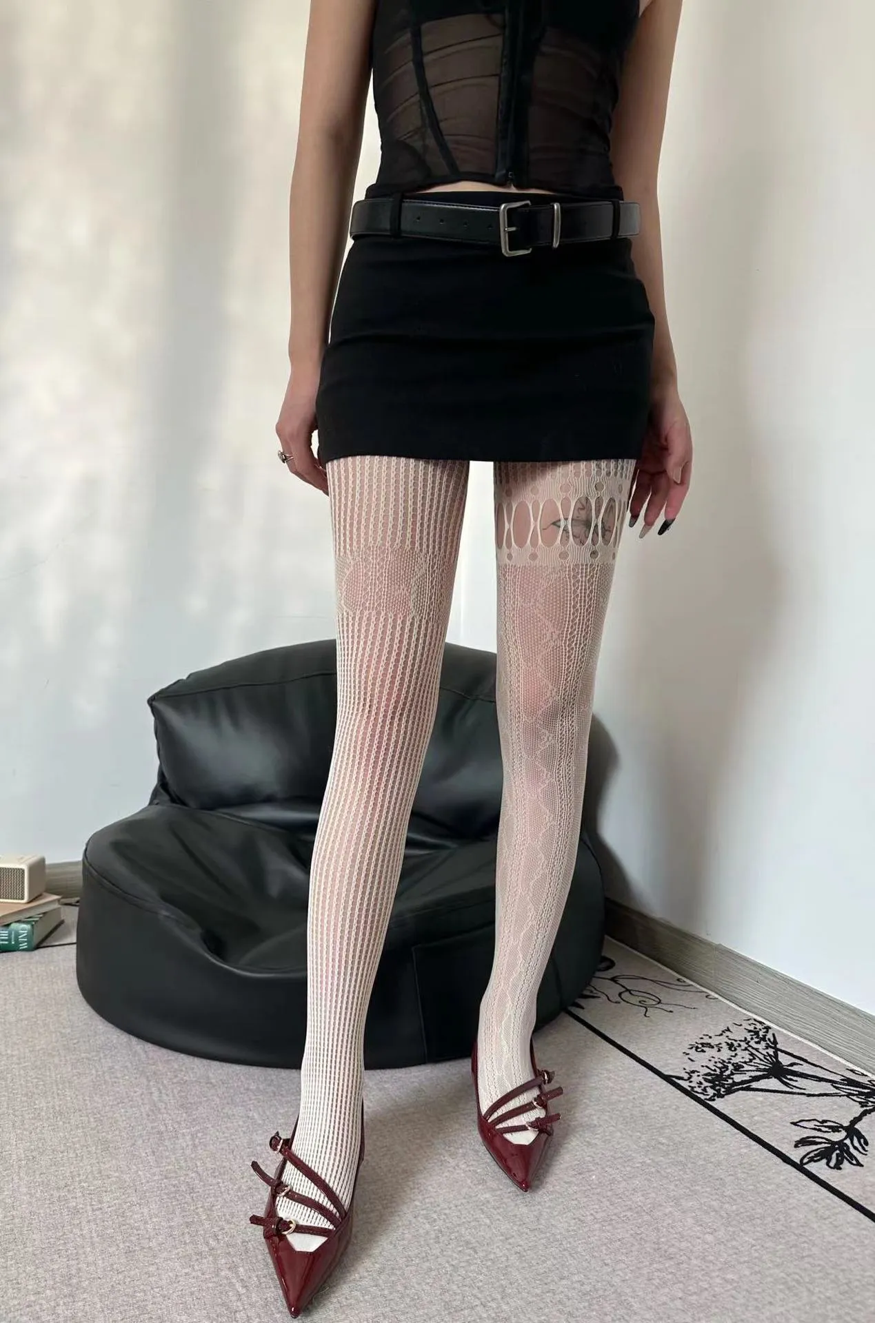 Asymmetrical fishnet vertical stripe hollow out tights