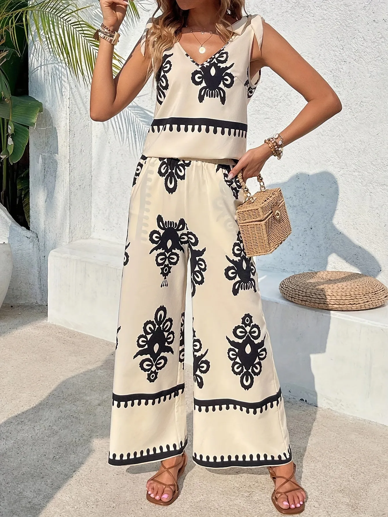 Tribal Print Pantsuit Outfit - Chic Knot Strap, Flattering V Neck, Sultry Backless Tank Top, Flowy Wide Leg, Convenient Pocket Pants - Stylish Womens Clothing for Fashion-Conscious Individuals